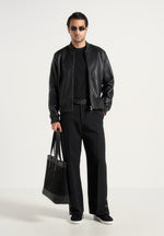 boris-relaxed-fit-tailored-button-cuff-trousers-black