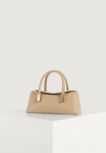 Annelise - Pebbled Leather Baguette Bag - Beige
