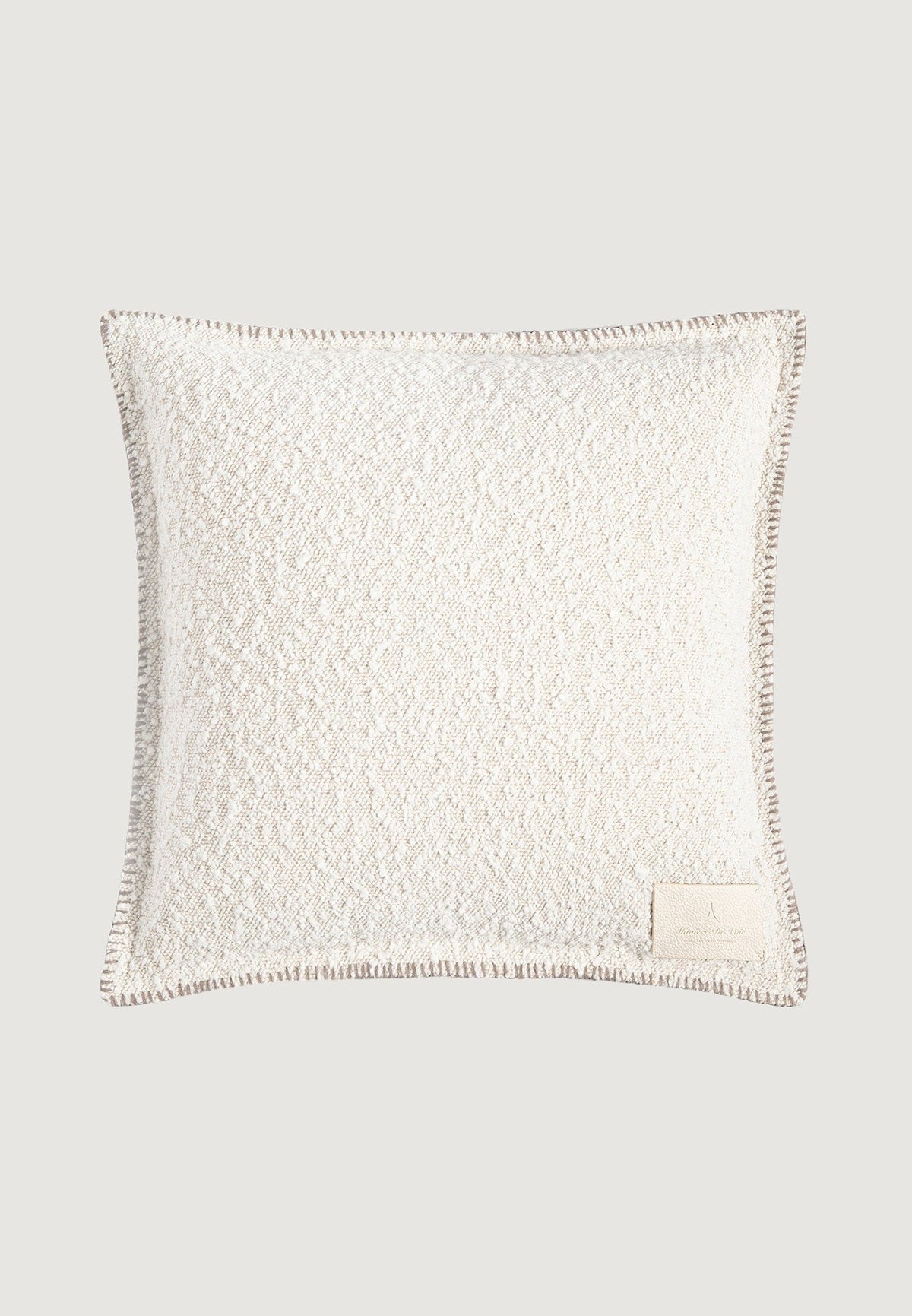 boucle-and-whipstitch-reversible-cushion-brown-cream