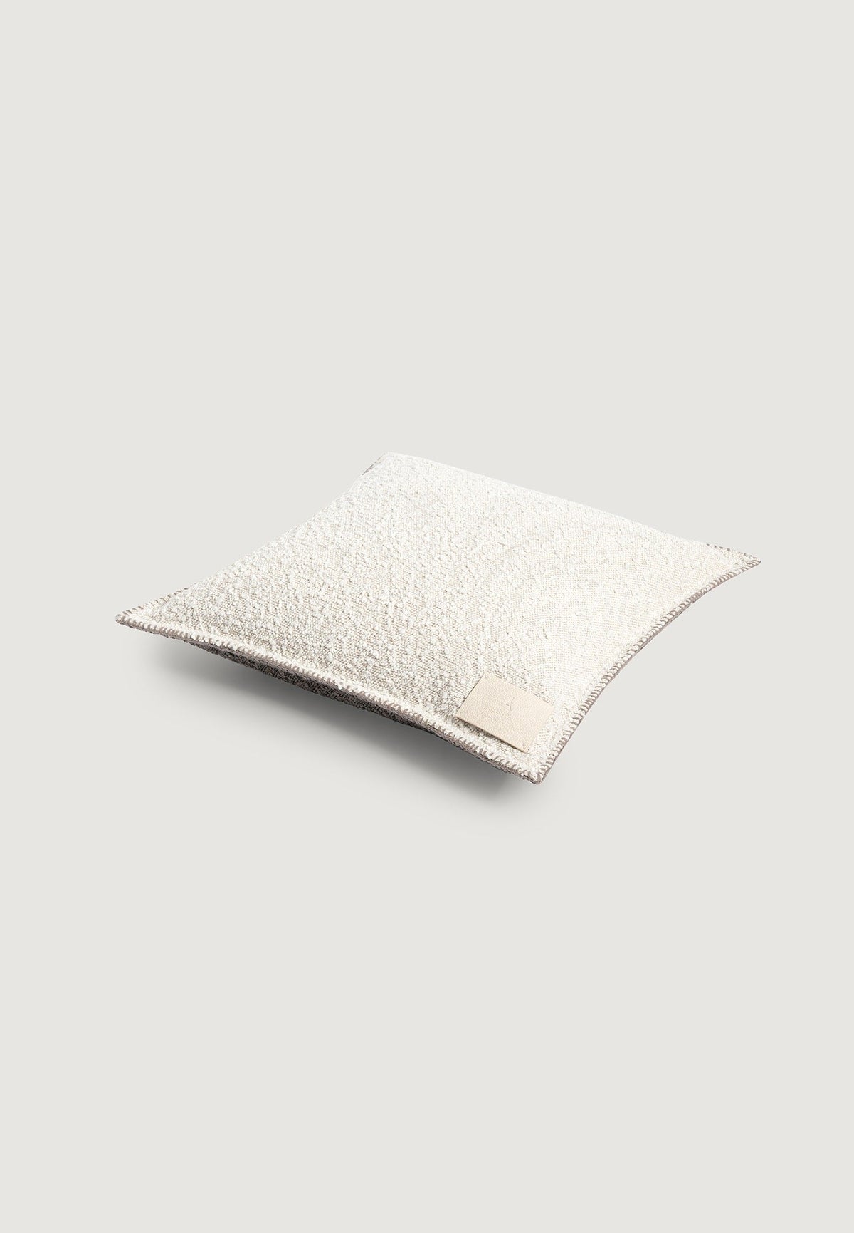 boucle-and-whipstitch-reversible-cushion-brown-cream