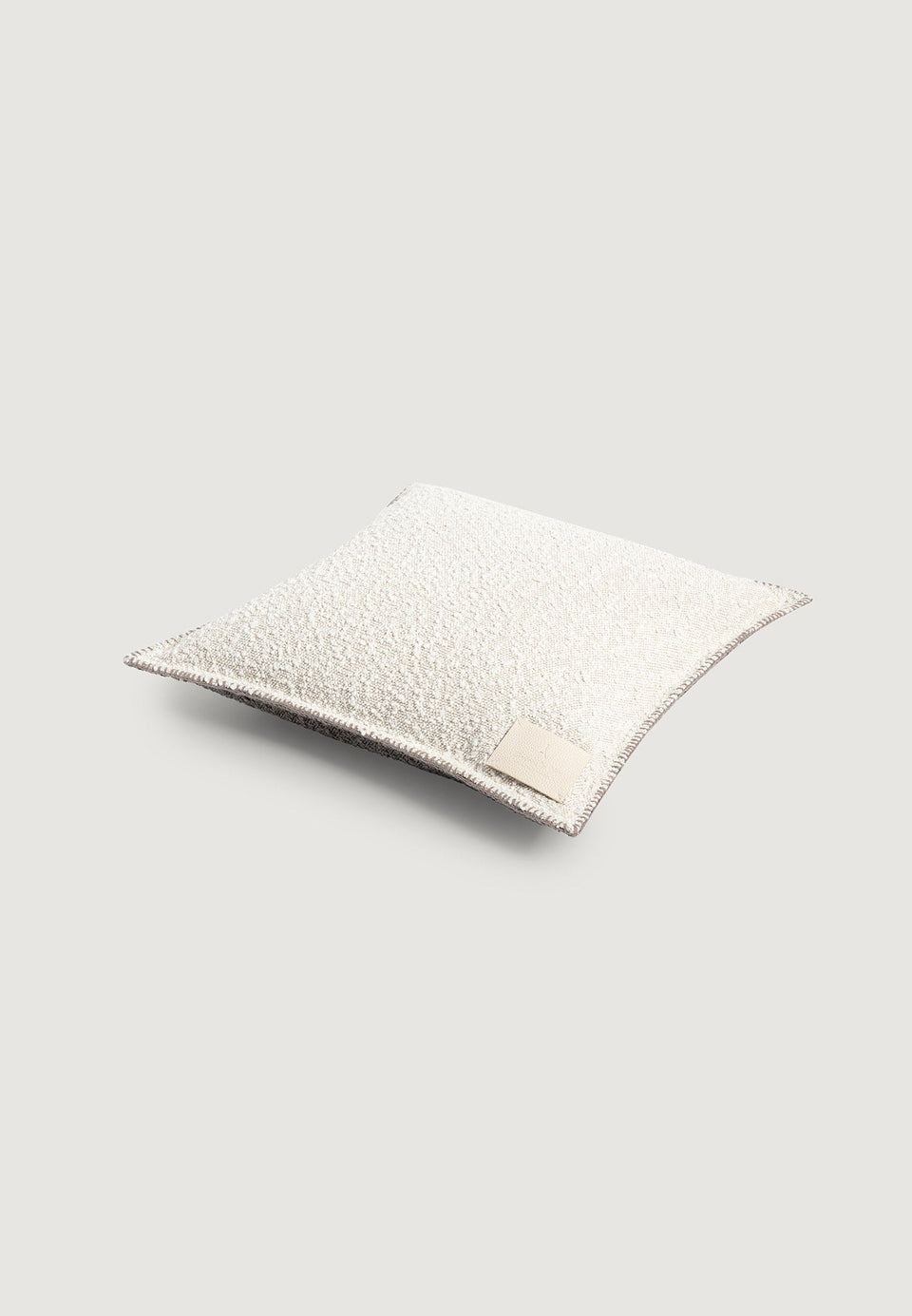 boucle-and-whipstitch-reversible-cushion-brown-cream