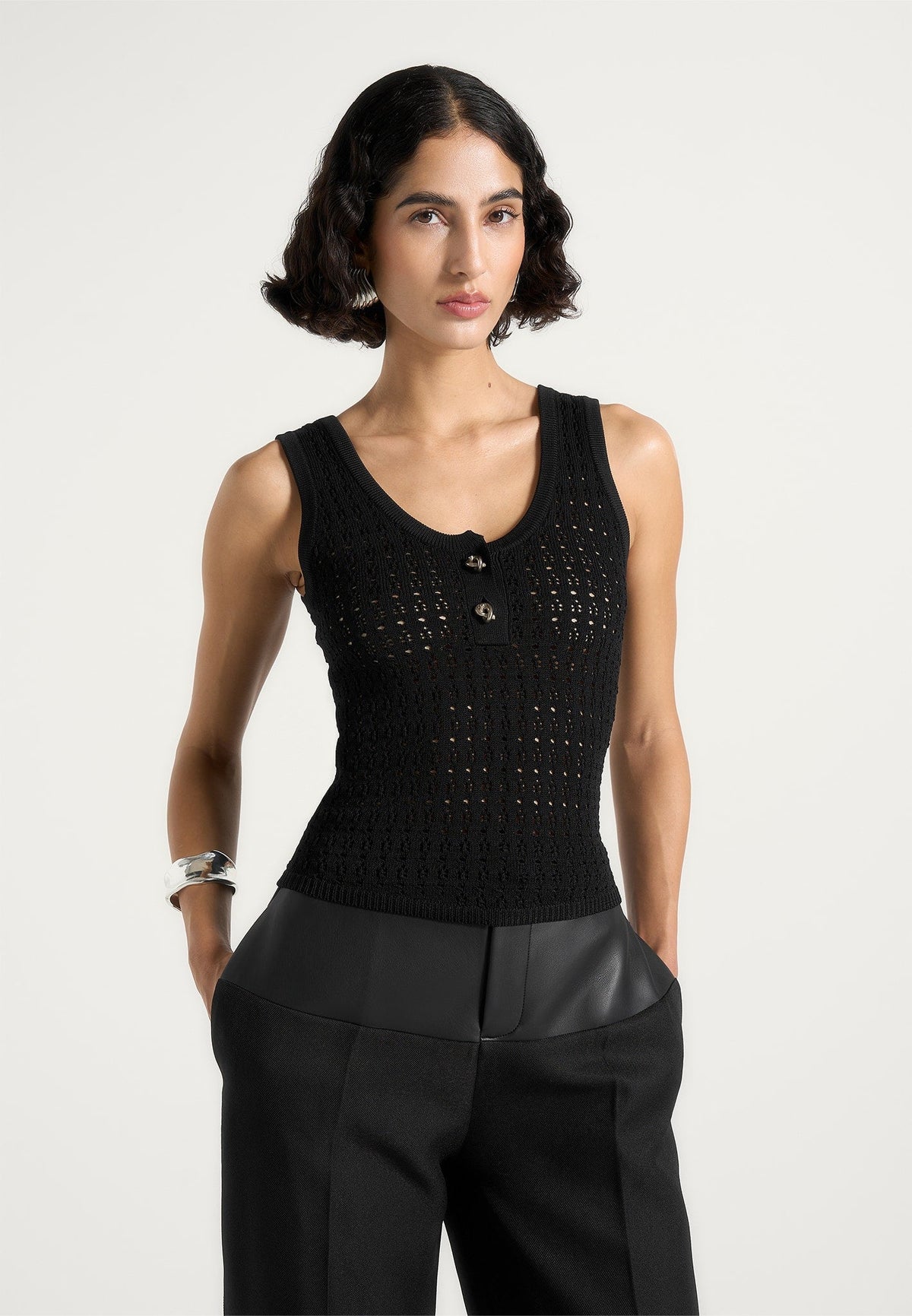 nora-pointelle-knitted-vest-with-knot-button-black