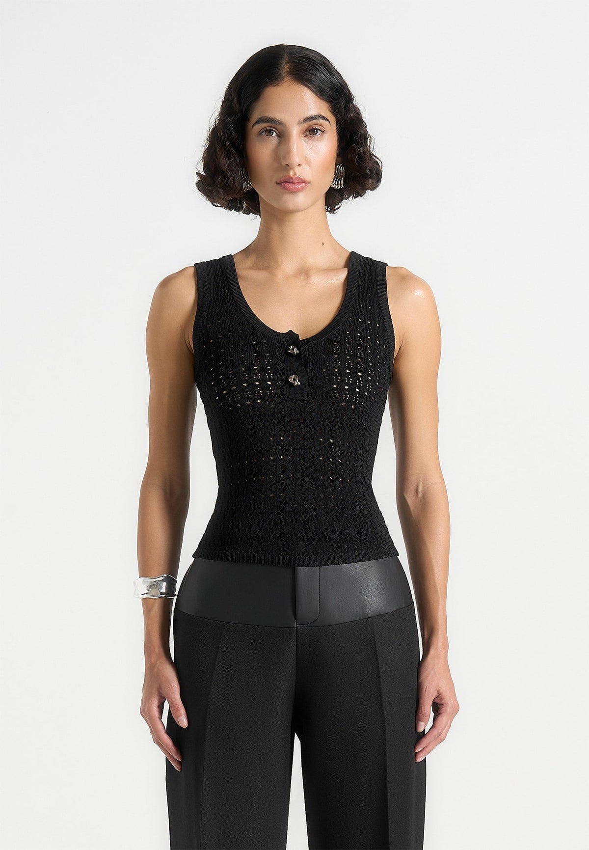 nora-pointelle-knitted-vest-with-knot-button-black