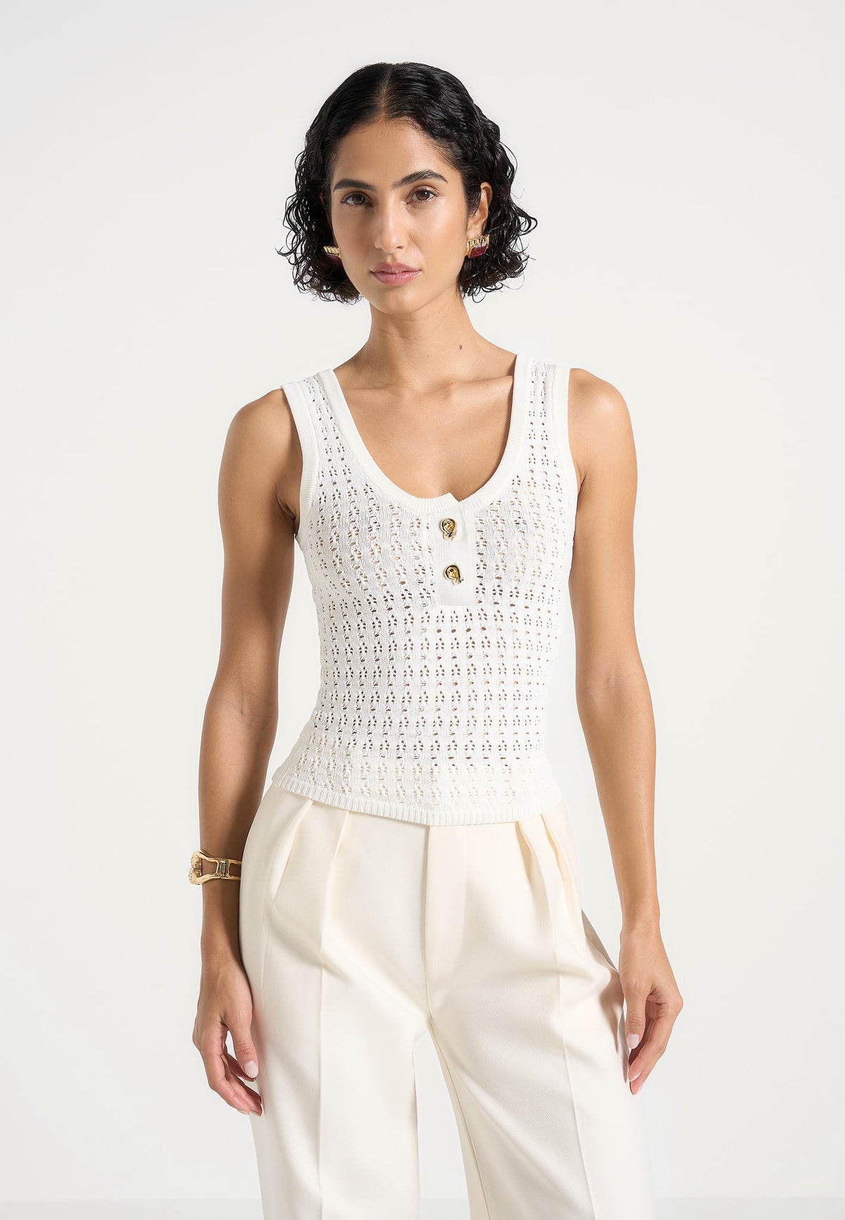 nora-pointelle-knitted-vest-with-knot-button-cream