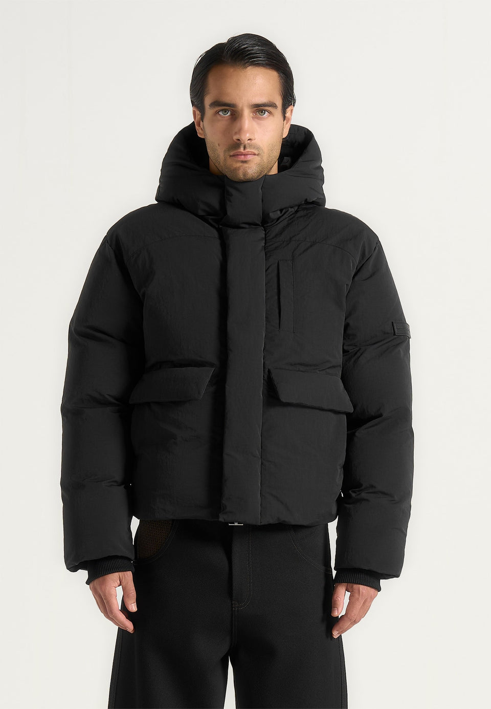 casey-unisex-minimal-raglan-puffer-jacket-black