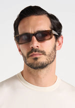 milan-curved-frame-sunglasses-brown