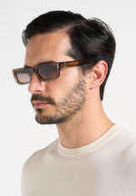 milan-curved-frame-sunglasses-brown