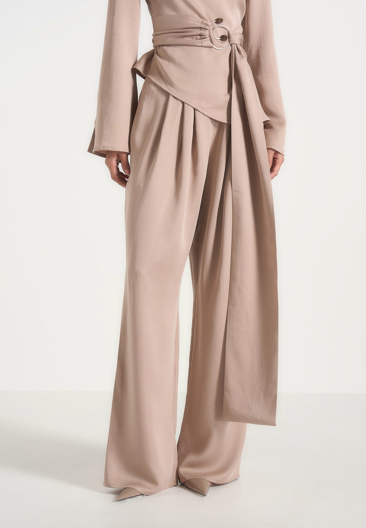 aurore-mock-neck-ring-belt-pleated-leg-jumpsuit-beige