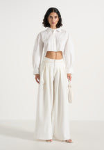 flora-box-pleat-wide-leg-belted-trousers-white