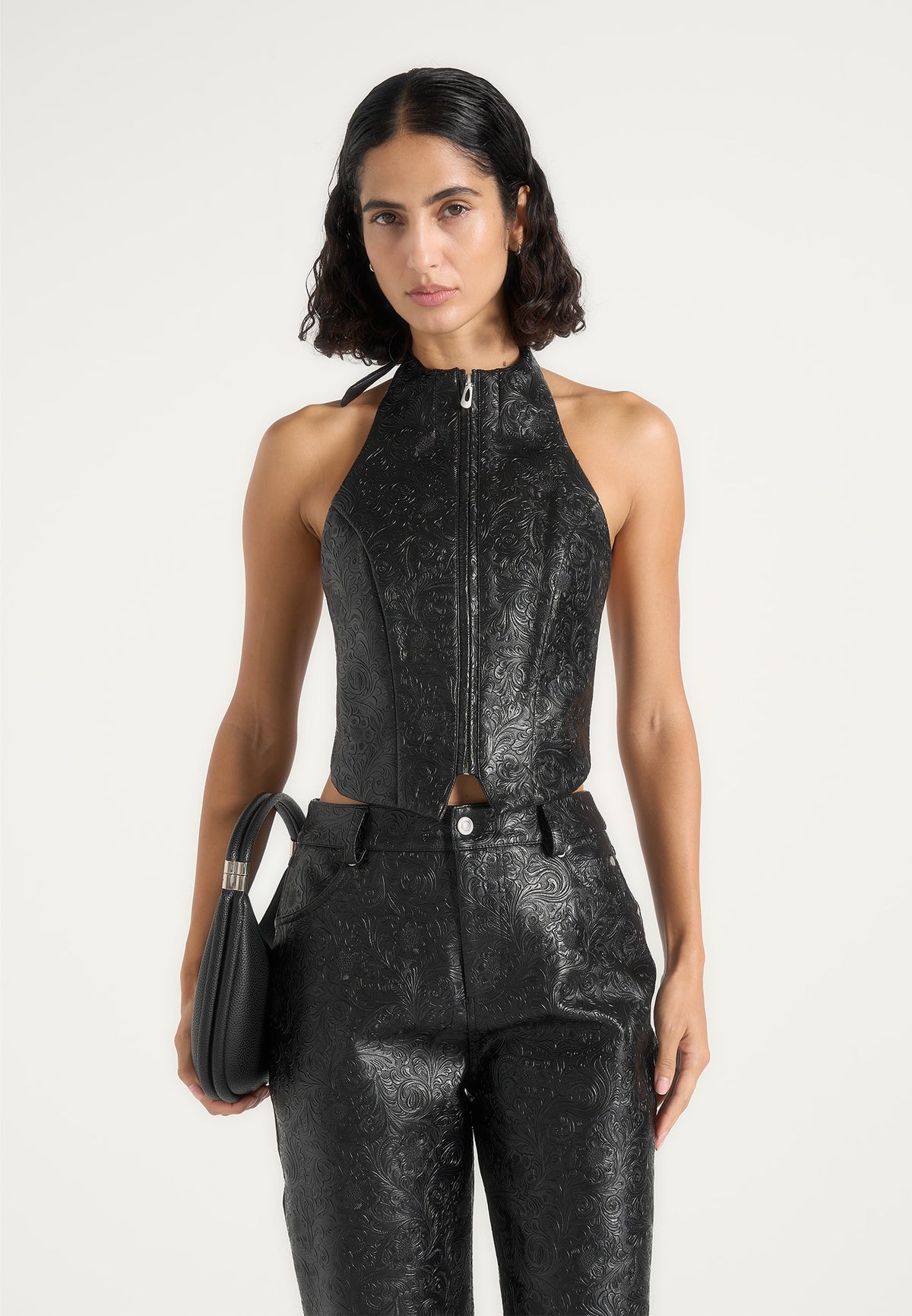 claudette-embossed-leather-halter-backless-top-black