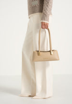 Annelise - Pebbled Leather Baguette Bag - Beige